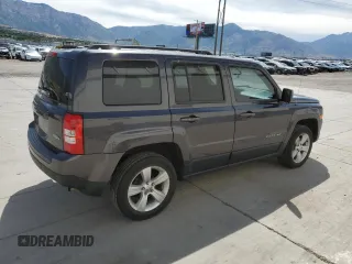 2014 Jeep Patriot Latitude with VIN 1C4NJRFB1ED727017, listed as a Copart auction lot 61660885 with 151,097 mi miles and Salvage title. Bid and sale history available at DreamBid. Image 3.