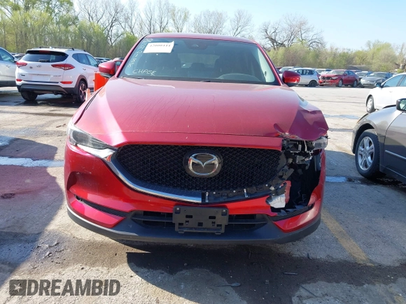 2021 Mazda CX-5 Grand Touring with VIN JM3KFBDM8M1390188, listed as a IAAI auction lot 42000444 with 84,908 mi miles. Bid and sale history available at carsss.com. Image 11.