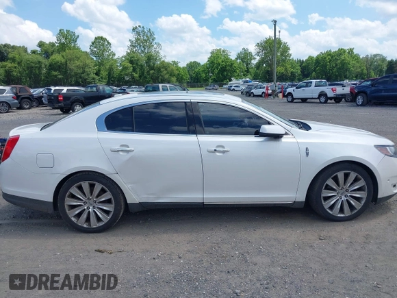 2013 Lincoln MKS EcoBoost with VIN 1LNHL9FT0DG606567, listed as a IAAI auction lot 42561162 with 285,830 mi miles and . Bid and sale history available at DreamBid. Image 13.