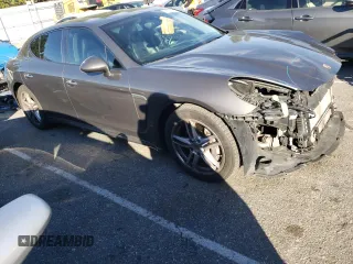 2015 Porsche Panamera 4 z VIN WP0AA2A74FL002284, wystawiony jako Copart lot #68167942 z przebiegiem 86 921 mil mil oraz . Historia ofert i sprzedaży dostępna na DreamBid. Obrazek 4.