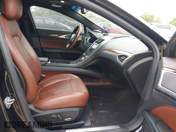 2017 Lincoln MKZ Reserve z VIN 3LN6L5EC4HR619712, wystawiony jako IAAI lot #41899418 z przebiegiem 77 481 mil mil oraz . Historia ofert i sprzedaży dostępna na DreamBid. Obrazek 5.