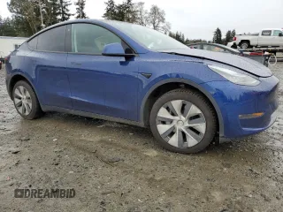 2021 Tesla Model Y Long Range with VIN 5YJYGDEE7MF160510, listed as a Copart auction lot 51098925 with 48,038 mi miles and Salvage Title. Bid and sale history available at DreamBid. Image 4.