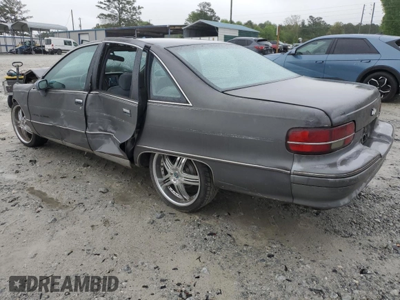 1991 Chevrolet Caprice z VIN 1G1BN53E1MW223013, wystawiony jako Copart lot #49857604 z przebiegiem 224 278 mil mil oraz Szkoda całkowita • Salvage title. Historia ofert i sprzedaży dostępna na DreamBid. Obrazek 2.