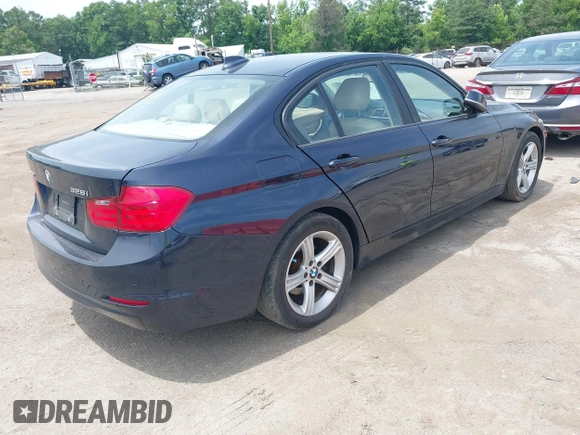 2014 BMW 3 Series 328i xDrive with VIN WBA3B5G51ENS11317, listed as a IAAI auction lot 42494223 with 171,528 mi miles and . Bid and sale history available at DreamBid. Image 4.