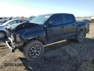 2021 GMC Canyon 4WD AT4 w/Leather with VIN 1GTG6FEN3M1274409, listed as a Copart auction lot 42502355 with 57,194 mi miles and Salvage Title. Bid and sale history available at carsss.com. Image 1.