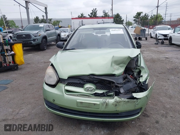 2008 Hyundai Accent GS with VIN KMHCM36C48U073067, listed as a IAAI auction lot 42055217 with 173,949 mi miles. Bid and sale history available at carsss.com. Image 12.
