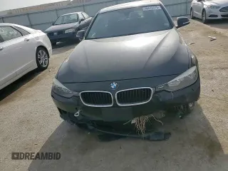 2014 BMW 3 Series 328i xDrive with VIN WBA3B5G58ENS11072, listed as a Copart auction lot 56572315 with 145,000 mi miles and Salvage title. Bid and sale history available at DreamBid. Image 13.