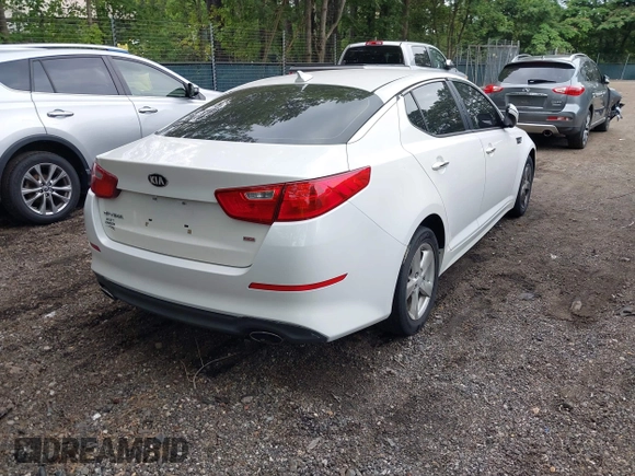 2015 Kia Optima LX with VIN KNAGM4A7XF5599309, listed as a IAAI auction lot 42493215 with 143,703 mi miles and . Bid and sale history available at DreamBid. Image 4.