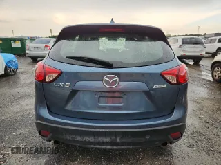 2015 Mazda CX-5 Sport with VIN JM3KE2BE3F0488309, listed as a Copart auction lot 63688835 with 121,775 mi miles and Clean title. Bid and sale history available at DreamBid. Image 6.