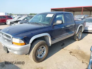 2004 Dodge Dakota SLT with VIN 1D7HG48N14S610012, listed as a IAAI auction lot 39853794 with 158,998 mi miles and . Bid and sale history available at carsss.com. Image 2.