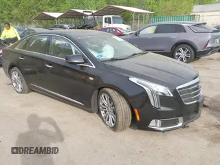 2019 Cadillac XTS Luxury with VIN 2G61M5S30K9111477, listed as a IAAI auction lot 42110879 with 90,136 mi miles and . Bid and sale history available at DreamBid. Image 1.