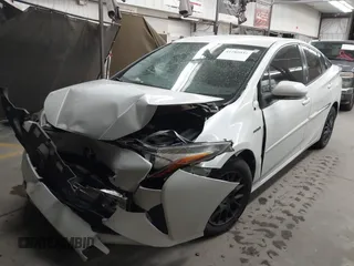 2016 Toyota Prius Two with VIN JTDKBRFU3G3513060, listed as a IAAI auction lot 41789034 with 153,391 mi miles and . Bid and sale history available at DreamBid. Image 2.