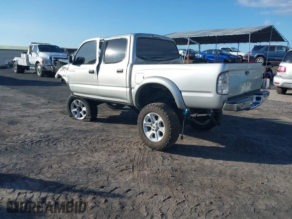 2002 Toyota Tacoma PreRunner with VIN 5TEGN92N42Z005511, listed as a IAAI auction lot 41313457 with Not Provided miles and . Bid and sale history available at DreamBid. Image 3.