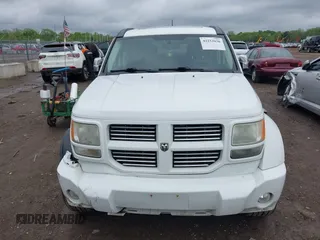 2011 Dodge Nitro Heat z VIN 1D4PU4GK7BW598432, wystawiony jako IAAI lot #42252036 z przebiegiem 148 329 mil mil oraz . Historia ofert i sprzedaży dostępna na DreamBid. Obrazek 12.