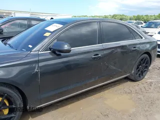 2011 Audi A8 с VIN WAURVAFDXBN020316, выставлен на аукционе IAAI как лот 42297622 с пробегом 156 881 миль миль и . История ставок и продаж доступна на DreamBid. Изображение 14.