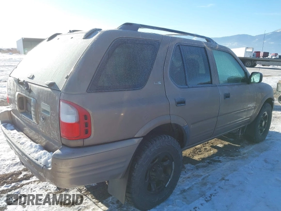 2002 Isuzu Rodeo with VIN 4S2DM58W824320291, listed as a IAAI auction lot 41385761 with 177,441 mi miles. Bid and sale history available at carsss.com. Image 4.