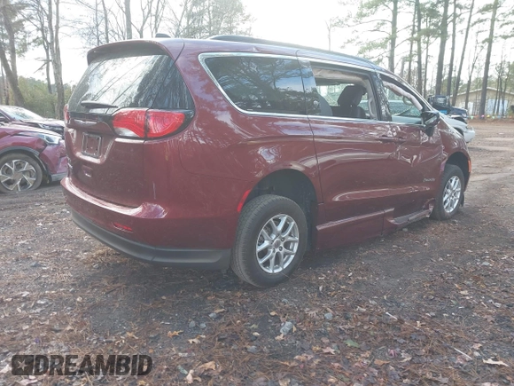 2021 Chrysler Voyager LXi with VIN 2C4RC1DG1MR556020, listed as a IAAI auction lot 41044760 with 6,286 mi miles and . Bid and sale history available at DreamBid. Image 4.