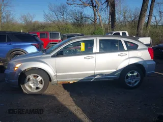 2009 Dodge Caliber SXT z VIN 1B3HB48A79D103215, wystawiony jako IAAI lot #41973831 z przebiegiem 134 797 mil mil oraz . Historia ofert i sprzedaży dostępna na DreamBid. Obrazek 14.