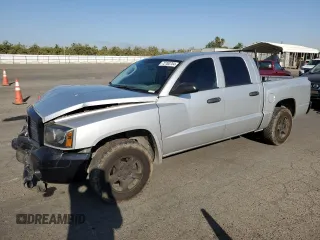 2007 Dodge Dakota SLT with VIN 1D7HW48N97S242802, listed as a Copart auction lot 72783704 with 151,906 mi miles and Salvage title. Bid and sale history available at DreamBid. Image 1.
