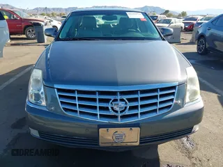 2008 Cadillac DTS 1SA z VIN 1G6KD57Y08U186328, wystawiony jako IAAI lot #41618974 z przebiegiem 71 920 mil mil oraz . Historia ofert i sprzedaży dostępna na DreamBid. Obrazek 12.