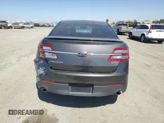 2015 Ford Taurus SEL with VIN 1FAHP2E8XFG209390, listed as a Copart auction lot 58992305 with 99,498 mi miles and Salvage title. Bid and sale history available at DreamBid. Image 6.