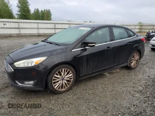 2015 Ford Focus Titanium with VIN 1FADP3J23FL269878, listed as a Copart auction lot 55171975 with 84,499 mi miles and Clean Title. Bid and sale history available at carsss.com. Image 1.