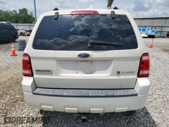 2009 Ford Escape Hybrid with VIN 1FMCU59309KC19243, listed as a Copart auction lot 61416915 with 74,732 mi miles and Salvage title. Bid and sale history available at DreamBid. Image 6.