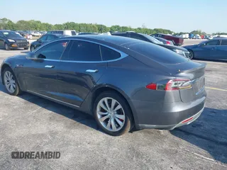 2015 Tesla Model S 85D with VIN 5YJSA1H46FF082264, listed as a IAAI auction lot 42068959 with 98,693 mi miles. Bid and sale history available at carsss.com. Image 3.