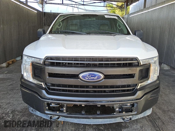 2018 Ford F-150 XL z VIN 1FTMF1EB2JFD61180, wystawiony jako Copart lot #60848285 z przebiegiem 152 990 mil mil oraz Czysty tytuł • Clean title. Historia ofert i sprzedaży dostępna na DreamBid. Obrazek 5.