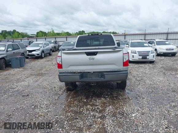 2017 Nissan Titan Pro-4X z VIN 1N6BA1F45HN529090, wystawiony jako IAAI lot #42163486 z przebiegiem 162 226 mil mil oraz . Historia ofert i sprzedaży dostępna na DreamBid. Obrazek 17.