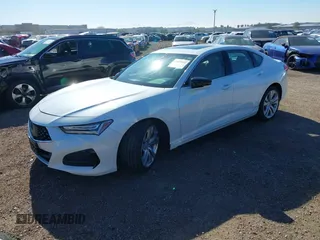 2021 Acura TLX Technology z VIN 19UUB5F48MA002731, wystawiony jako IAAI lot #41820962 z przebiegiem 30 747 mil mil oraz . Historia ofert i sprzedaży dostępna na DreamBid. Obrazek 2.