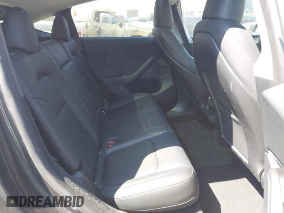 2024 Tesla Model Y Long Range with VIN 7SAYGDEE6RA225161, listed as a IAAI auction lot 42083140 with 28,289 mi miles and . Bid and sale history available at DreamBid. Image 8.