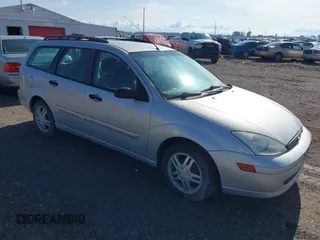 2001 Ford Focus SE z VIN 1FAFP363X1W343475, wystawiony jako IAAI lot #42390133 z przebiegiem 127 282 mil mil oraz . Historia ofert i sprzedaży dostępna na DreamBid. Obrazek 1.