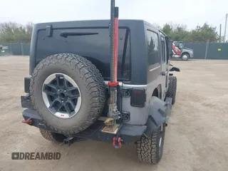 2015 Jeep Wrangler Unlimited Rubicon with VIN 1C4BJWFG1FL546018, listed as a IAAI auction lot 42060045 with 107,249 mi miles and . Bid and sale history available at DreamBid. Image 4.