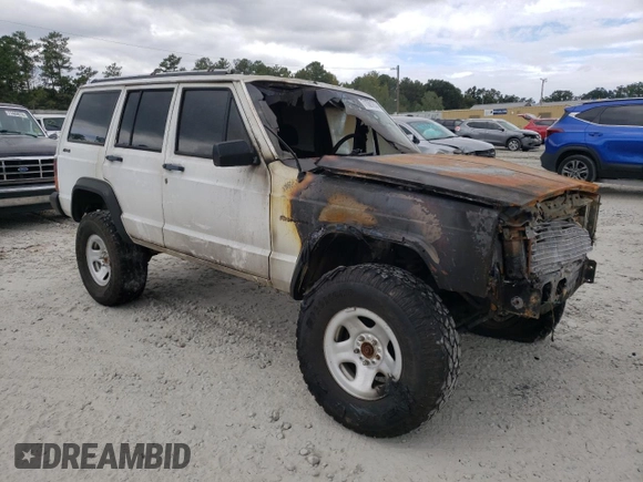 1992 Jeep Cherokee SE with VIN 1J4FJ28S1NL154354, listed as a Copart auction lot 71081634 with 0 mi miles and Salvage Title. Bid and sale history available at carsss.com. Image 4.