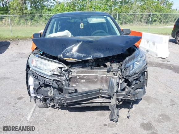 2015 Honda CR-V LX with VIN 2HKRM3H38FH512323, listed as a IAAI auction lot 39161499 with 133,787 mi miles. Bid and sale history available at carsss.com. Image 6.