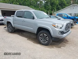 2021 Toyota Tacoma SR with VIN 3TYCZ5AN5MT030404, listed as a IAAI auction lot 42485368 with 43,278 mi miles and . Bid and sale history available at DreamBid. Image 1.