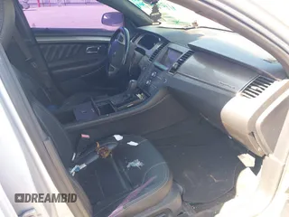 2013 Ford Taurus SEL with VIN 1FAHP2E81DG129229, listed as a IAAI auction lot 41999326 with 205,856 mi miles. Bid and sale history available at carsss.com. Image 5.