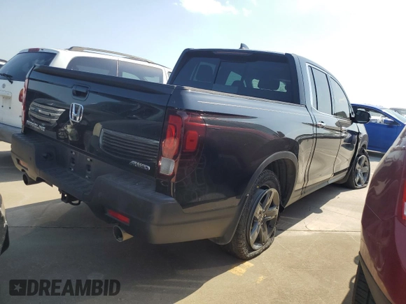 2023 Honda Ridgeline RTL-E with VIN 5FPYK3F72PB001592, listed as a Copart auction lot 52154625 with 41,153 mi miles and Salvage title. Bid and sale history available at DreamBid. Image 3.