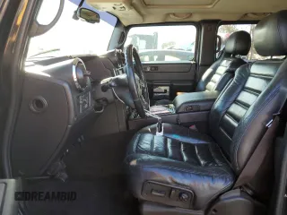 2006 Hummer H2 with VIN 5GRGN23U96H101430, listed as a Copart auction lot 75453514 with 168,958 mi miles and Salvage Title. Bid and sale history available at carsss.com. Image 7.
