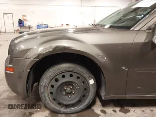 2010 Chrysler 300 Touring with VIN 2C3CA5CV9AH213299, listed as a IAAI auction lot 41754215 with 172,467 mi miles. Bid and sale history available at carsss.com. Image 6.