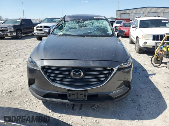 2021 Mazda CX-9 Touring z VIN JM3TCACY5M0500924, wystawiony jako Copart lot #50654505 z przebiegiem 57 067 mil mil oraz Szkoda całkowita • Salvage title. Historia ofert i sprzedaży dostępna na DreamBid. Obrazek 5.