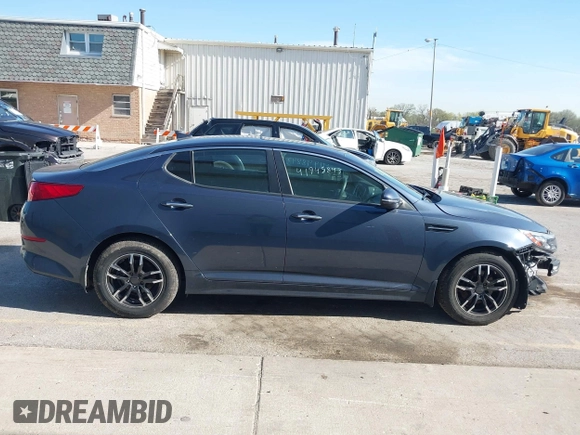 2015 Kia Optima LX with VIN 5XXGM4A77FG381505, listed as a IAAI auction lot 42105568 with 164,641 mi miles and . Bid and sale history available at DreamBid. Image 14.