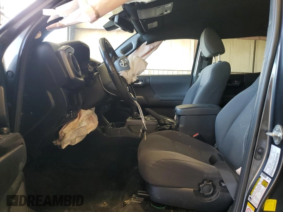 2019 Toyota Tacoma SR z VIN 3TMCZ5AN8KM197011, wystawiony jako Copart lot #56198675 z przebiegiem 117 363 mil mil oraz Szkoda całkowita • Salvage title. Historia ofert i sprzedaży dostępna na DreamBid. Obrazek 7.