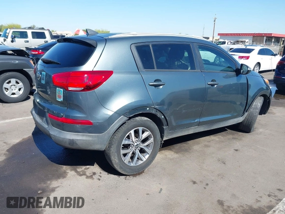 2015 Kia Sportage LX with VIN KNDPB3ACXF7696918, listed as a IAAI auction lot 42179023 with 64,181 mi miles and . Bid and sale history available at DreamBid. Image 4.