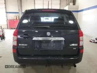 2012 Suzuki Grand Vitara Premium z VIN JS3TD0D66C4100814, wystawiony jako Copart lot #89250025 z przebiegiem 102 381 mil mil oraz Szkody całkowita. Historia ofert i sprzedaży dostępna na DreamBid. Obrazek 6.