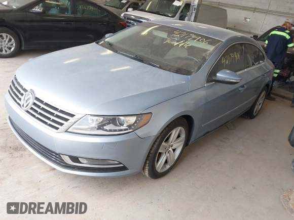 2013 Volkswagen CC Sport with VIN WVWBP7AN1DE567561, listed as a IAAI auction lot 42174906 with 157,827 mi miles. Bid and sale history available at carsss.com. Image 2.