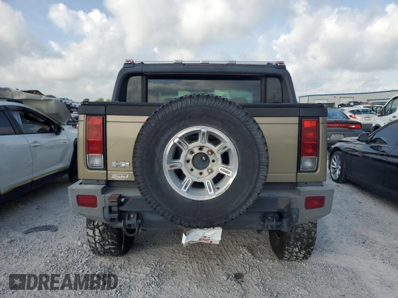 2006 Hummer H2 z VIN 5GRGN22U46H107234, wystawiony jako Copart lot #54389475 z przebiegiem Nie podano mil oraz Czysty tytuł • Clean title. Historia ofert i sprzedaży dostępna na DreamBid. Obrazek 6.
