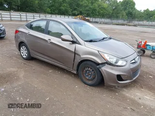 2014 Hyundai Accent GLS with VIN KMHCT4AE9EU667067, listed as a IAAI auction lot 42808407 with 126,465 mi miles and . Bid and sale history available at DreamBid. Image 1.