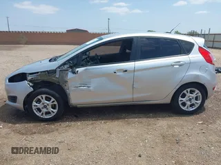 2014 Ford Fiesta SE with VIN 3FADP4EJ4EM151911, listed as a IAAI auction lot 42096321 with 129,938 mi miles and . Bid and sale history available at DreamBid. Image 15.